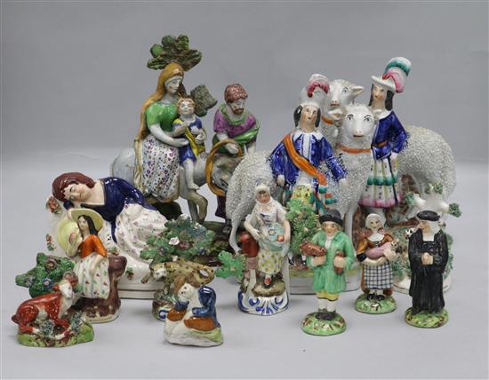 A quantity of Staffordshire flatback figures